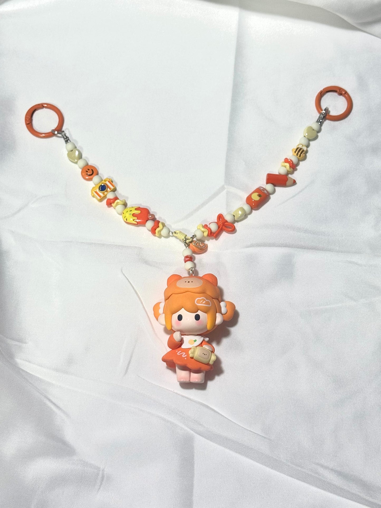 UU Sweetland Bag Charm - Orange Egg Roll